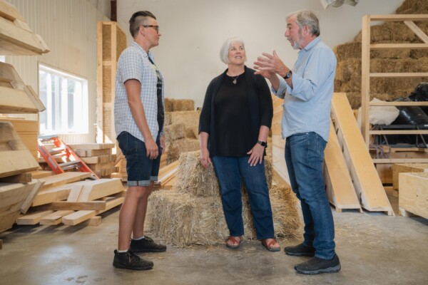 New Frameworks co-founder Ace McArleton meets with VSJF Business Coaches Peter Cole and Carolyn Cooke at the company’s headquarters in Essex Junction. Photo by Erica Houskeeper.