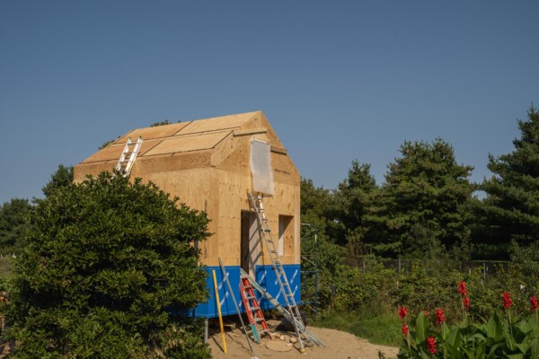 A new building is constructed in Burlington’s Old North End. New Frameworks has worked with clients to custom design low-embodied carbon housing using natural and non-toxic materials. Using materials such as straw bales, local lumber, clay and lime plasters, and non-toxic paints, the company was an early adopter to green building. Photo by Erica Houskeeper.