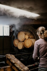 Dave DuCharme used steam to separate the cambium from the bark. Photo by Hannah Natalya.